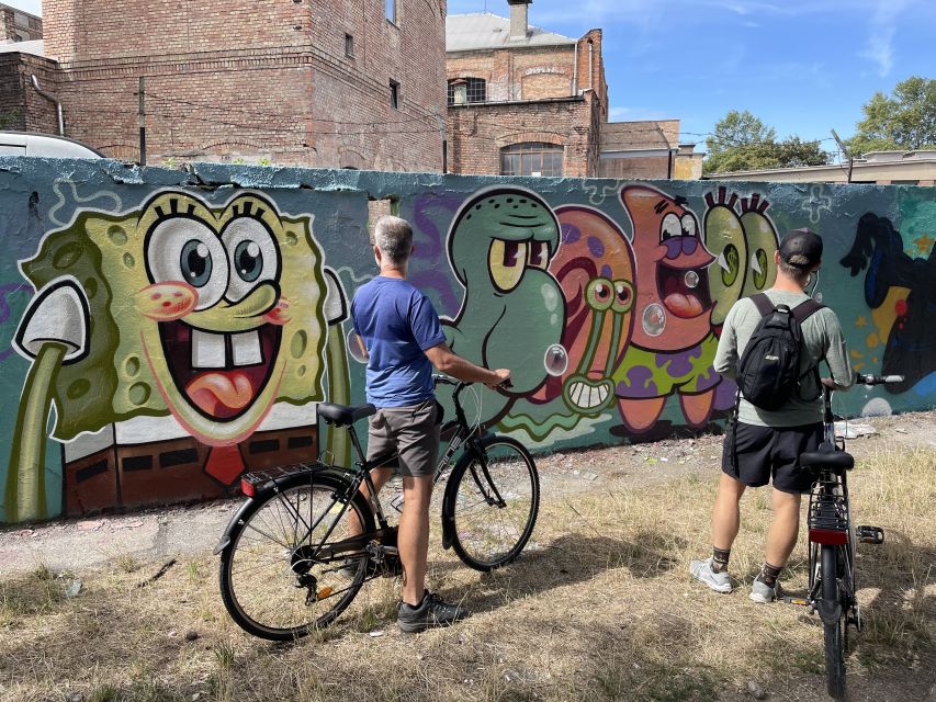 Alternative Bike tour: Graffiti Wall and Peace - The legal graffiti wall stop: oldest wall energy, young artist focus