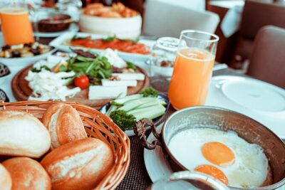 Bottomless Brunch and Cruise with Prosecco in Budapest - The buffet spread: eggs, cheeses, pâté, and pastries