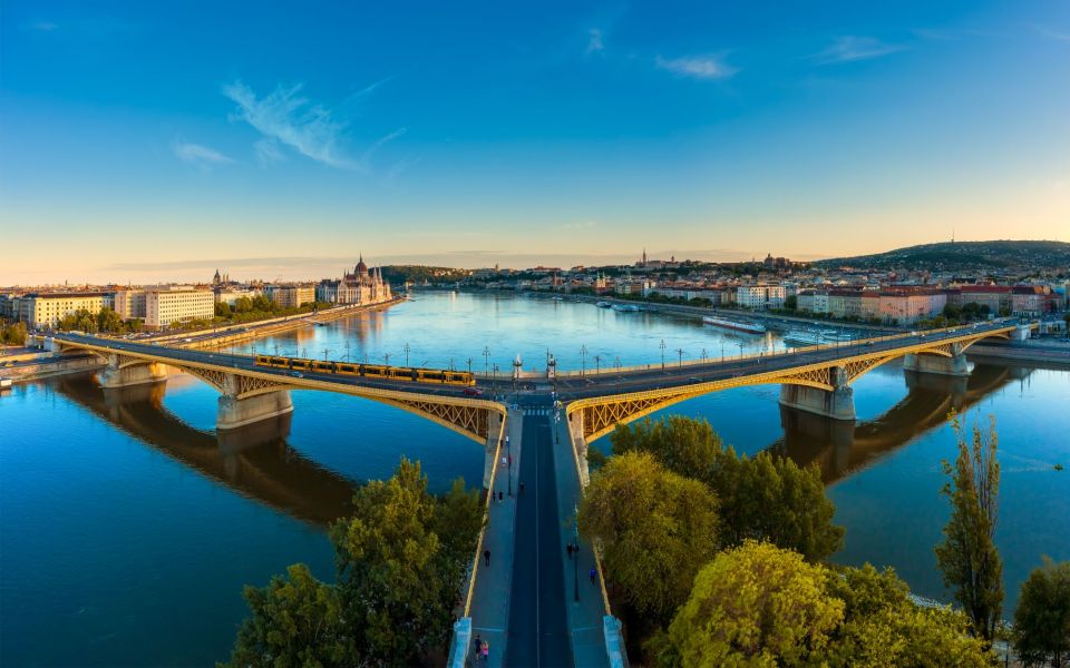Budapest: 1-hour Sightseeing Danube River Cruise - Onboard experience: warm inside, clear viewing, and audio that depends on where you sit