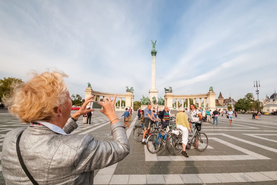 Budapest: Guided City Discovery Bike Tour - Shoes on the Danube Bank: a quiet pause with big visual impact