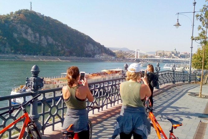 Budapest relaxed bicycle tour at sunset - The Shoes on the Danube Bank: a memorial stop that hits fast