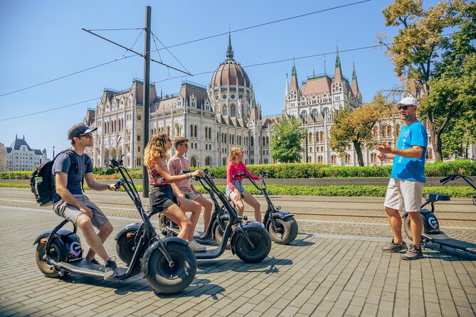 Budapest Small-Group Guided Tour on MonsteRoller e-Scooter - Pest Highlights on Scooter: Parliament Viewpoint, St Stephen’s, Liberty Square, and the Opera Lobby