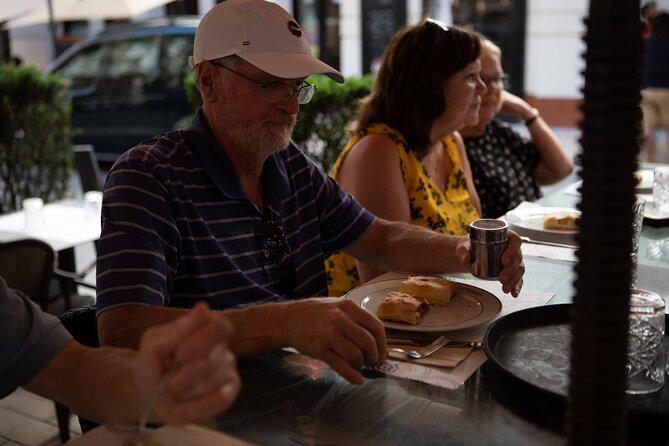 Budapest Urban Feast - Food Tour with Wine Tasting & Coffee House - Wine tasting inside the market: what’s included and what to watch