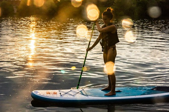 SUP Budapest: Sunset tour - End Point Reality Check: Slippery Rocks, Wet Shoes, and Changing